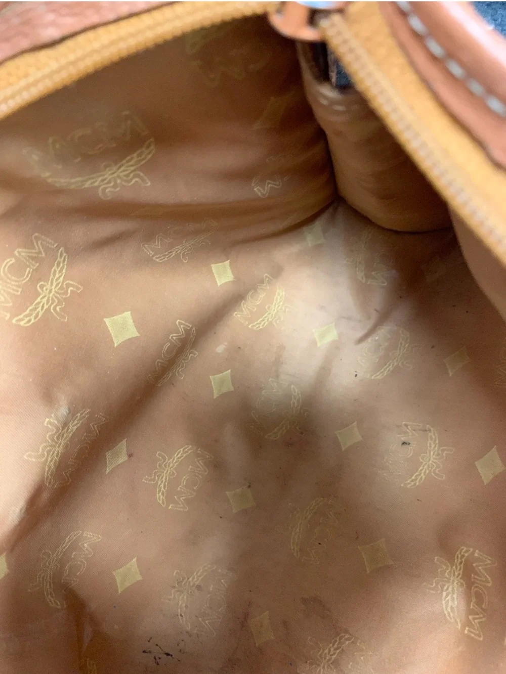 MCM Cognac and Black Visetos Monogram Pouch with Gold Plaque.